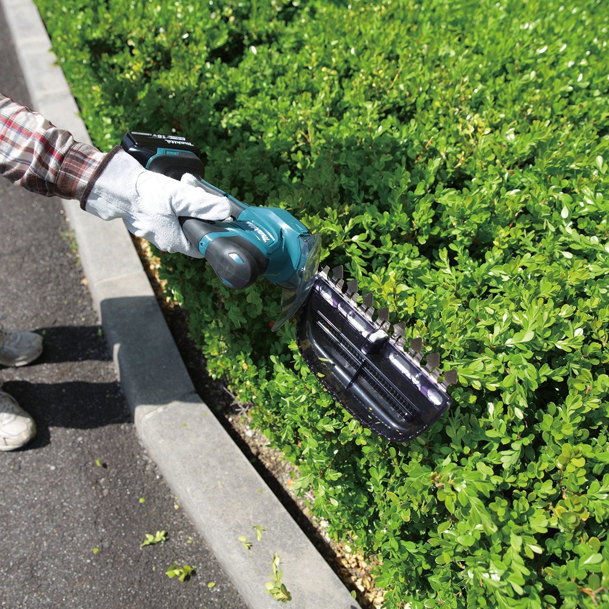 Makita Gras- und Rasenschere DUM604SYX 18 V 2-In-1