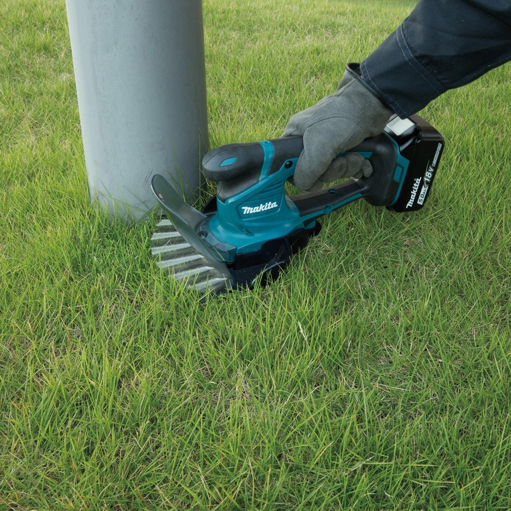 Makita Gras- und Rasenschere DUM604SYX 18 V 2-In-1