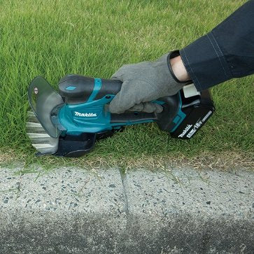 Makita Gras- und Rasenschere DUM604SYX 18 V 2-In-1